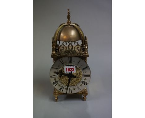 A reproduction small lantern style clock,&nbsp;26.5cm high.&nbsp; 