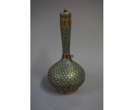 A Kashmiri enamel bottle vase and cover, 19th century, decorated with stylized leaves, 24.5cm high.&nbsp; 