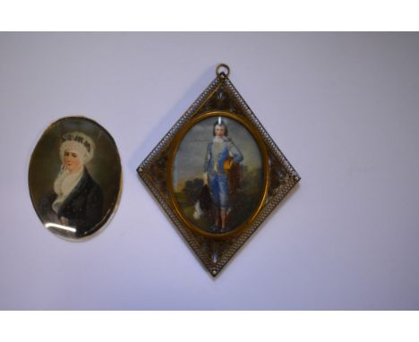 After Gainsborough,&nbsp;a portrait miniature of 'The Blue Boy', oil, 8.2 x 6.4cm oval, in a brass filigree frame; together w