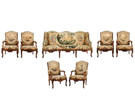 Louis XV-Salongarnitur mit sechs Fauteuils und einem SofaLehnhöhe: 106,5 / 104 cm.Breite: 70 / 195 cm.Sitzhöhe: 45 cm. Frankr