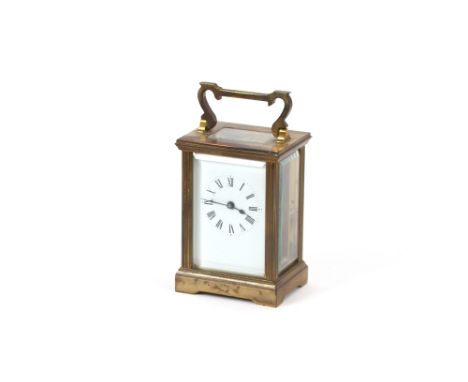 A brass cased carriage timepiece, having white enamel Roman numeral dial