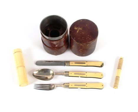 A 19th Century leather cased travelling campaign set, to include bone handled folding fork, knife and spoon, condiment case a