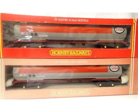 Two Hornby 100 ton Esso bogie tankers, very good to excellent condition, boxes fair/good. P&amp;P Group 1 (£14+VAT for the fi