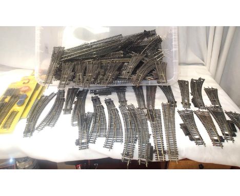 Quantity of OO scale track, and approximately 35x points (three new in packets), mostly used, ex layout, some may need attent