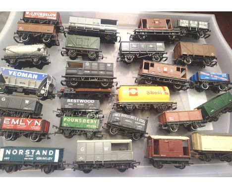 Twenty six assorted OO scale wagons, various makes and types, mostly good condition and unboxed. P&amp;P Group 1 (£14+VAT for