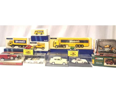 Selection of twelve boxed diecast vehicles, various makes and types. Mostly very good condition, includes Corgi Weetabix Coll