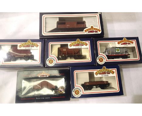 Six Bachmann wagons, various types including Queen Mary Brake. Mostly excellent condition, boxes with wear. P&amp;P Group 1 (