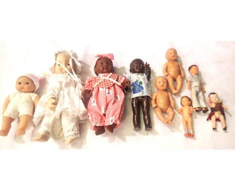 Nine vintage small dolls, tallest H: 20 cm. P&amp;P Group 1 (£14+VAT for the first lot and £1+VAT for subsequent lots) 
