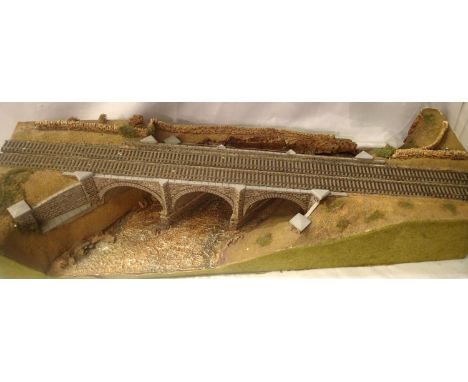 OO scale display track diorama, two tracks, crossing a viaduct, with water below, requires detailing. Not available for in-ho