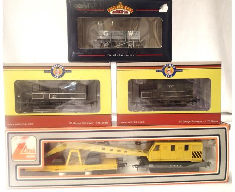 Lima LNER crane, yellow, two Oxford Rail GWR six wheel brake vans and a Bachmann GWR China Clay wagon. All very good conditio