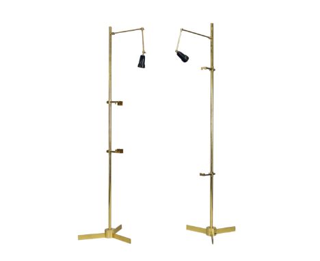 After Angelo Lelii   Two easel floor lamps, second half 20th century  Brass, lacquered metal  206cm and 202cm high respective