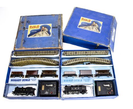 Two Boxed Hornby-Dublo 00 gauge 3-rail ref EDG7 LMS Steam Goods Train Sets, both with matt black sans-serif lettered LMS 0-6-