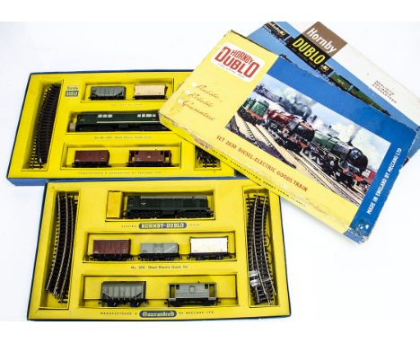 Boxed Hornby-Dublo 00 gauge 2-rail ref 2020 and 2033 Diesel Goods Train Sets, no 2020 with green 'Type 1' Bo-Bo locomotive D8