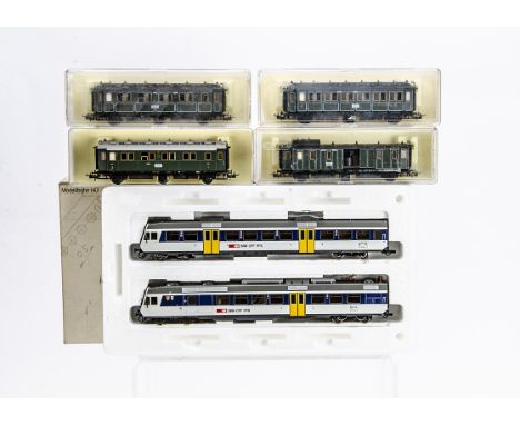 Liliput and Trix HO gauge Trains, a Liliput ref 144-58 Swiss 2-car electric multiple unit for 3-rail operation, with Trix 6-w