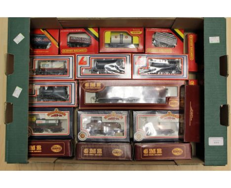 OO Gauge: A collection of eighteen boxed OO gauge wagons, various manufacturers including: Hornby, Lima, Airfix etc (one box)
