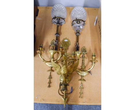 A Gilt Metal Zoomorphic Three Branch Wall Light, formed as a crown swan with out swept wings, the back plate ribbon tide and 