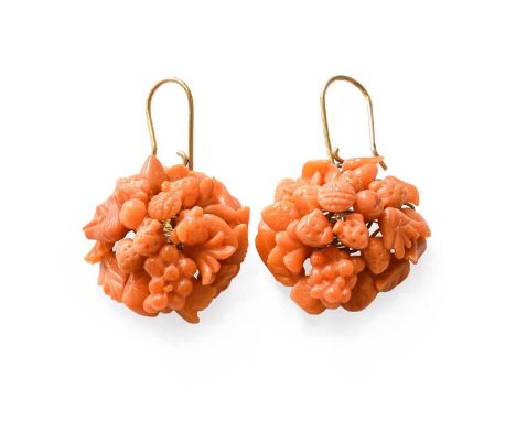 A Pair of Coral Drop Earrings, the coral clusters carved to depict foliate motifs, with yellow hook fittings, drop length 4.4