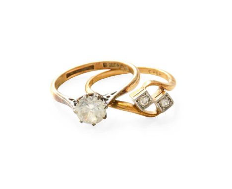 A Diamond Two Stone Twist Ring, stamped '18CT', finger size N; and A 9 Carat Gold Imitation Solitaire Ring, finger size MTwis