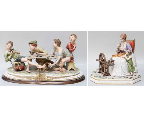 A Capodimonte Large Coloured Bisque Figure Group, by Bruno Merli, "The Card Cheat", modelled as four boys seated around a tab