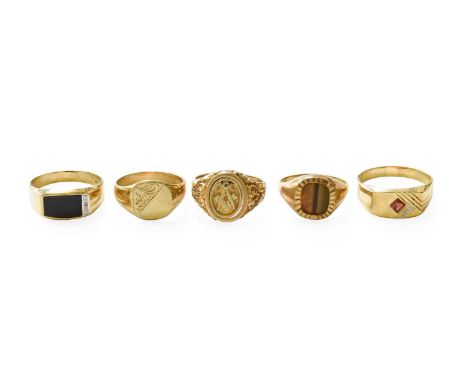 Five 9 Carat Gold Rings, including a masonic example, a tiger's-eye example, a signet ring etcGross weight 26.3 grams.