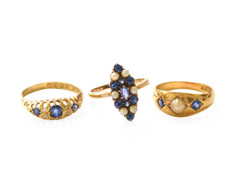 An 18 Carat Gold Sapphire and Diamond Ring, three graduated sapphires alternate with pairs of old cut diamonds in yellow claw