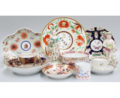 A Worcester Scale Blue Ground Fluted Plate, painted with birds and butterflies, circa 1770, two Derby figures, and a quantity