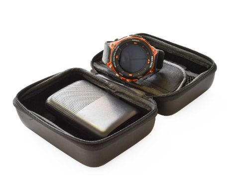 A Casio Protrek Smartwatch, with case, plug and charging wires