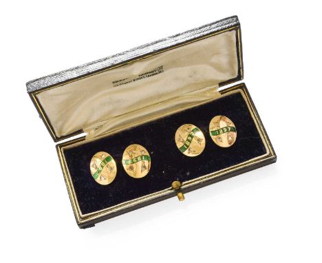 A Pair of Enamel and Diamond Cufflinks, the yellow chain linked oval plaques decorated with a green enamel ribbon dated 1897 