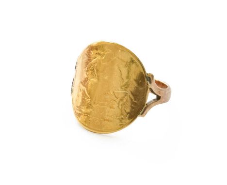 A Half Sovereign Ring, dated 1906, finger size PGross weight 5.2 grams.