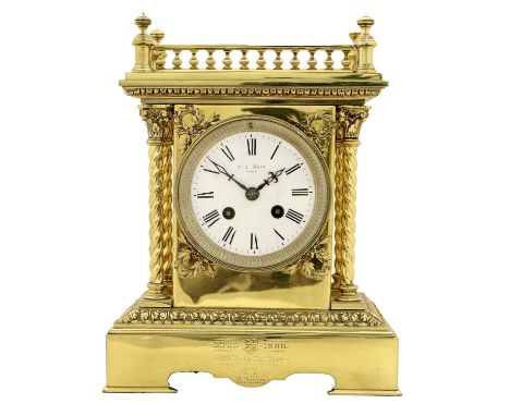 A Brass Striking Mantel Clock, retailed by W.C.Muir, Pairs, circa 1880, case with an engraved presentation inscription "1888 