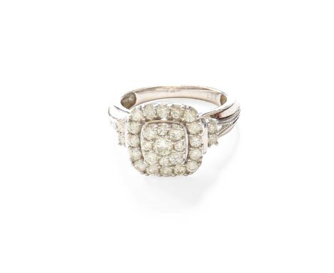 A 9 Carat White Gold Diamond Cluster Ring, the central raised cluster formed of round brilliant cut diamonds, to a stepped bo