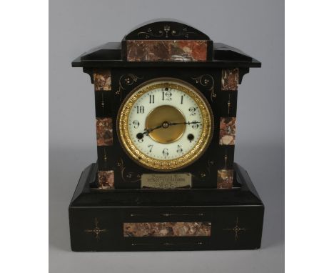 A slate and marble presentation mantle clock presented to Mr. &amp; Mrs. Richardson by the W.C.C.  