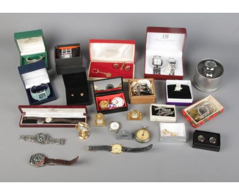 A collection of assorted costume jewellery and watches to include Luis Cardini couples wristwatch set, brooches, tie slides, 