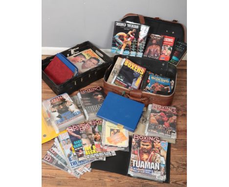 A box and a suitcase containing a large quantity of Boxing magazines and books. Includes Boxing Monthly, Boxing News, Ring Wa