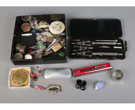 A tray of collectables to include Lee Guinness technical drawing set, compacts, napkin ring, small assorted of costume jewell
