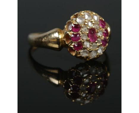 A late Victorian gold ruby and diamond cluster ring. Size M 1/2. 3.79g. Tests as high carat.  