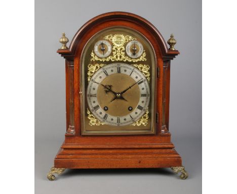 An early 20th century mahogany dome top bracket clock by Winterhalder &amp; Hofmeier. Having brass dial and subsidiary dials 