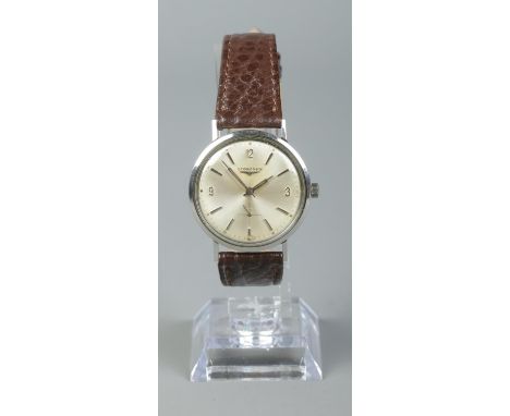 A gents stainless steel Longines manual wristwatch. Having silvered dial, baton and Arabic numeral markers and subsidiary sec