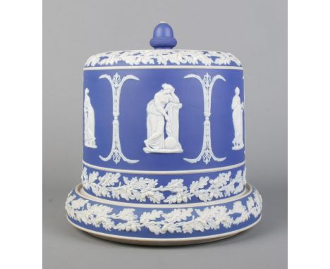A large 19th century Jasperware cheese dome. Having acorn finial and decorated with classical figure and oak branches. Height