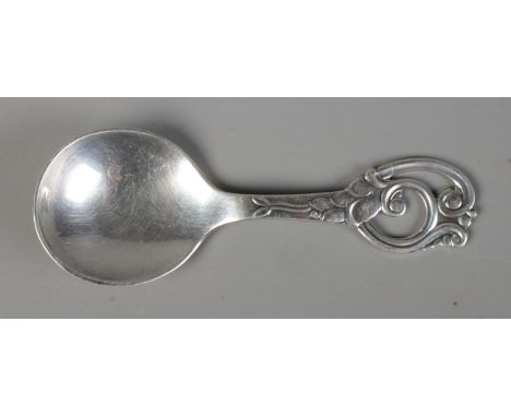 A silver caddy spoon by Johannes Siggaard with Danish three-titre hallmark 1949, 22g.  