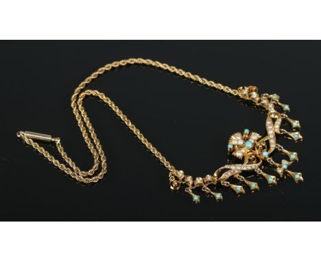 An early 20th century gold, seed pearl and turquoise necklace. Tests to 15ct. 11.15g.  