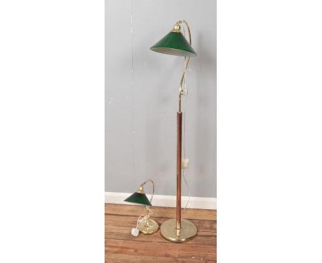 Two brass lamps with green glass shades including floor and desk lamp.  