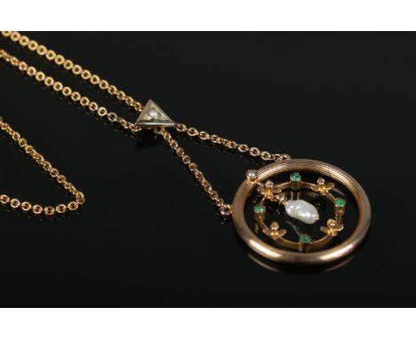 A 14ct gold, pearl and emerald pendant on 14ct gold chain. Stamped 585 with makers mark for H&amp;S. 4.54g.  