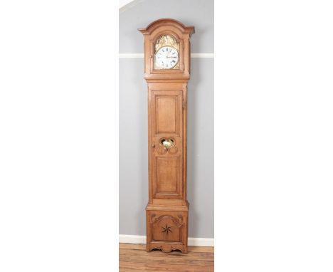 A 19th century French oak cased Comtoise clock.  Signs of historic woodworm