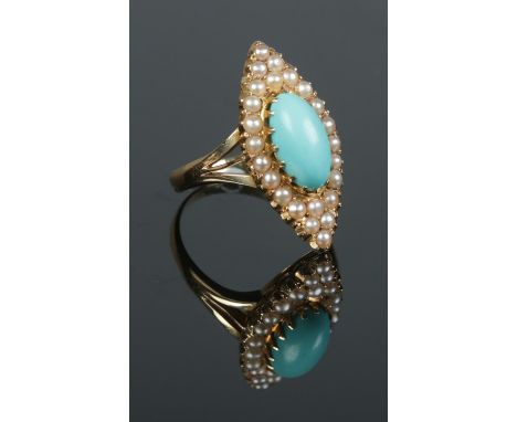 An 18ct gold turquoise and seed pearl navette ring. Size P 1/2. 6.91g.  