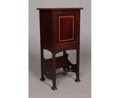 An Edwardian mahogany side cabinet with book trough under tier. Height 76.5cm, Width 35.5cm, Depth 31cm.  