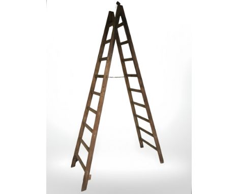 A large folding pine step ladder, length 265 cm 