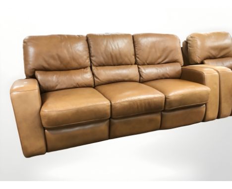 A contemporary stitched tan leather manual reclining three seater settee, 214 cm x 95 cm x 95 cm, together with matching armc