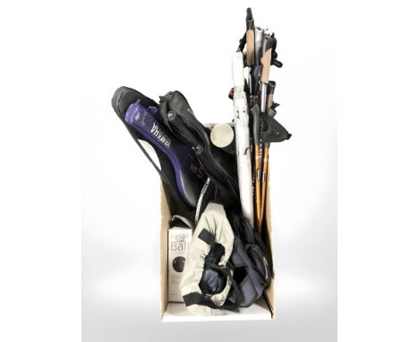 A group of mountaineering / walking sticks, rucksacks, tennis rackets, gym ball, etc. (1 box)