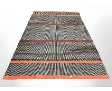 A 20th century flat weave carpet, 284cm by 190cm